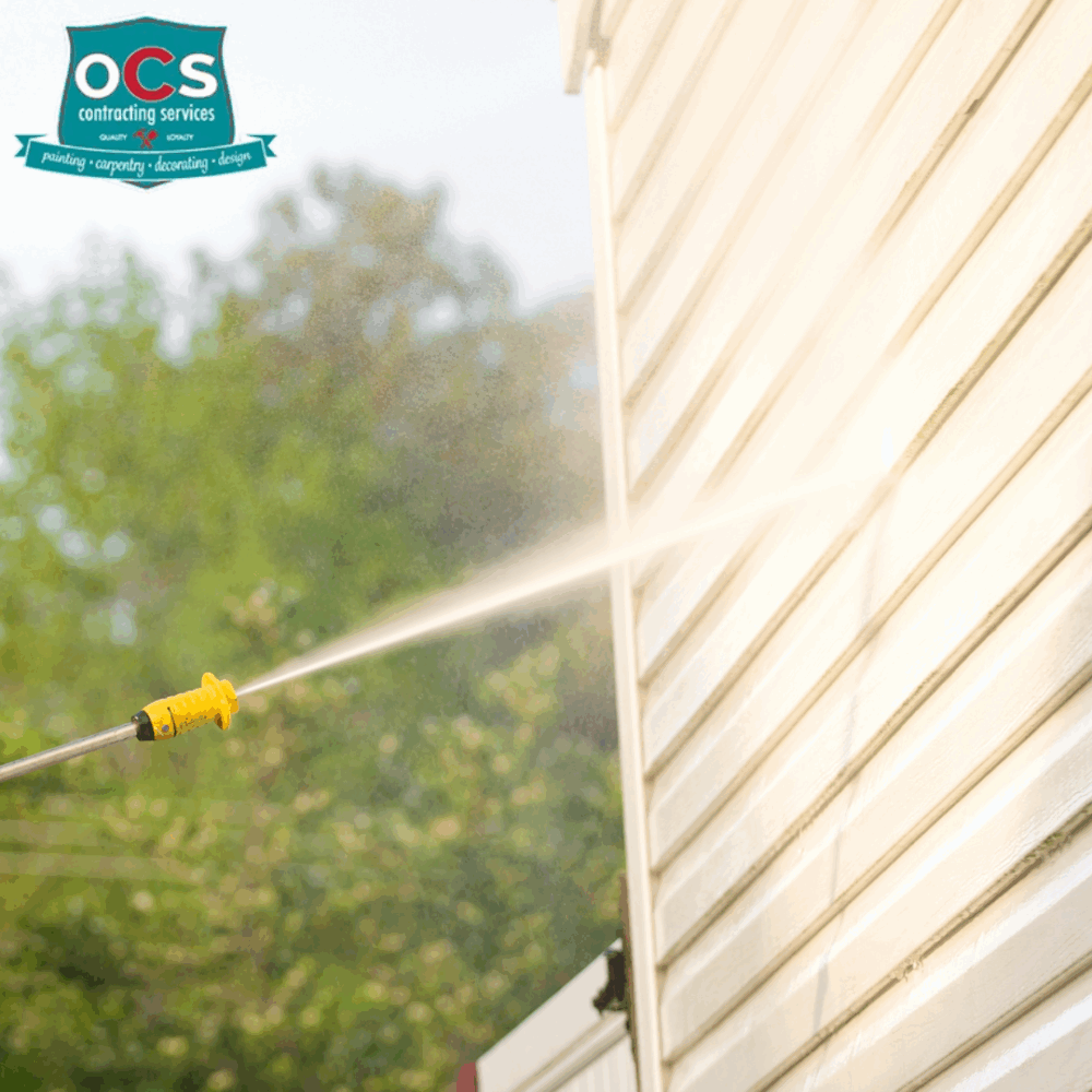 pressure washing a house