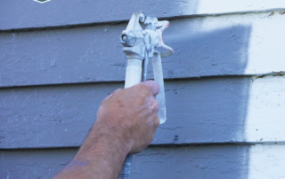 painting over weathered exterior